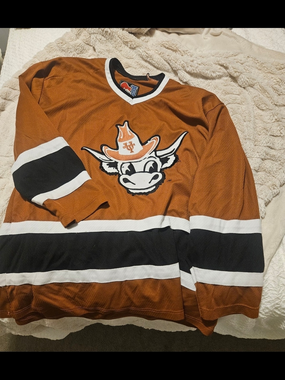 Match Orange and Black Hockey Jersey with Red Patch
